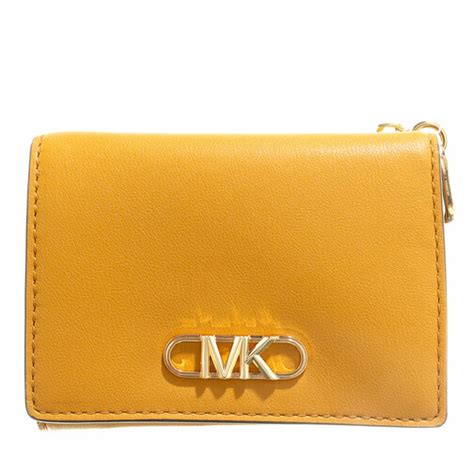 michael kors trifold wallet luggage|michael kors marigold wallet.